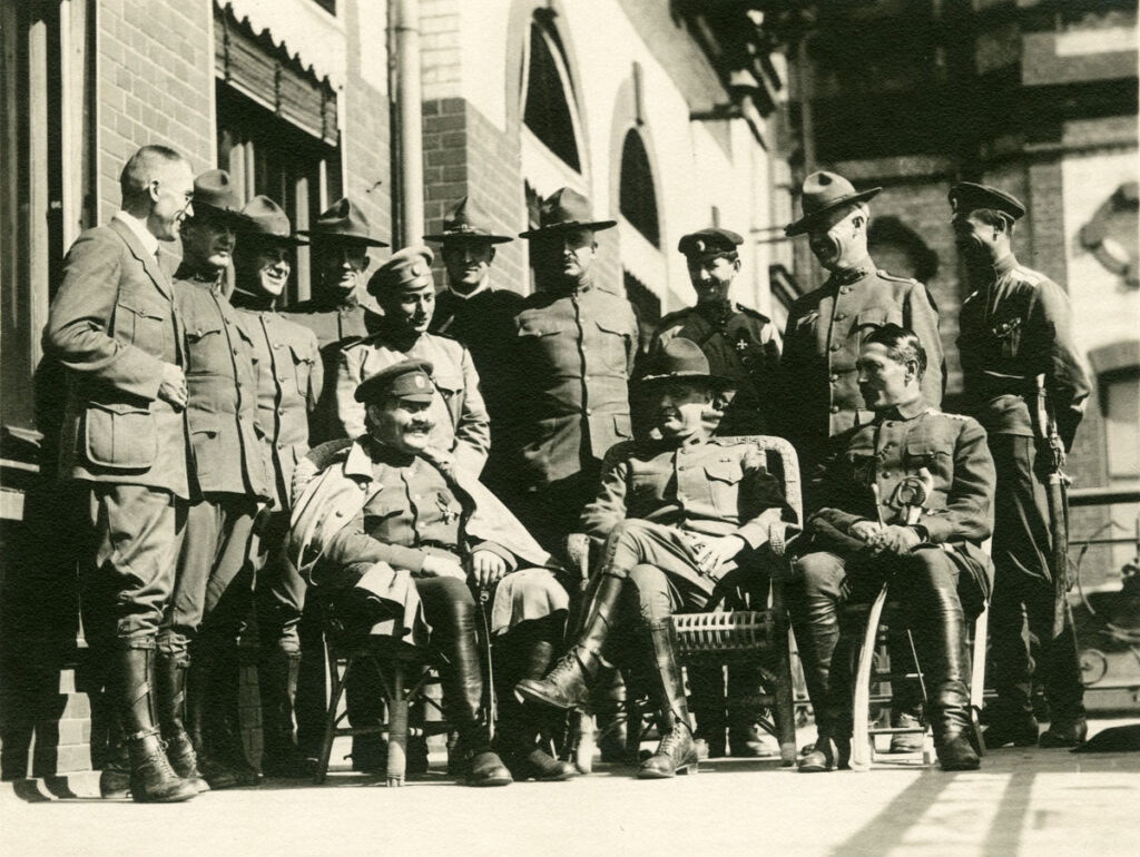 Ataman Semyonov with the representatives of the American expedition to the Russian Civil War. Seated: Semyonov (left) and General Graves (right)